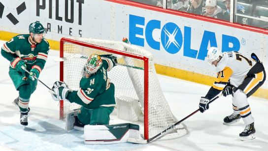 Malkin's overtime goal the difference in game with playoff intensity taken in St. Paul, Minn.  (Penguins)